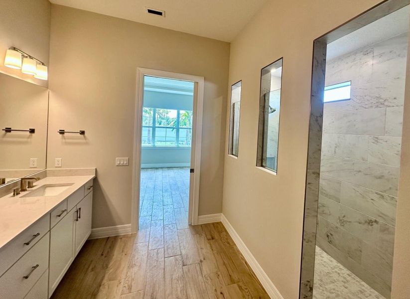 Furnished interior view inside a new home in Avondale at Avenir, Palm Beach Gardens (Image 14). Furnished interior view inside a new home in Avondale at Avenir, Palm Beach Gardens (Image 14).