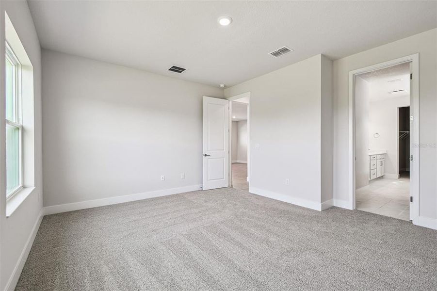 Spacious, unfurnished interior of a new home in Waterset Tradition Series, Apollo Beach (Image 26).