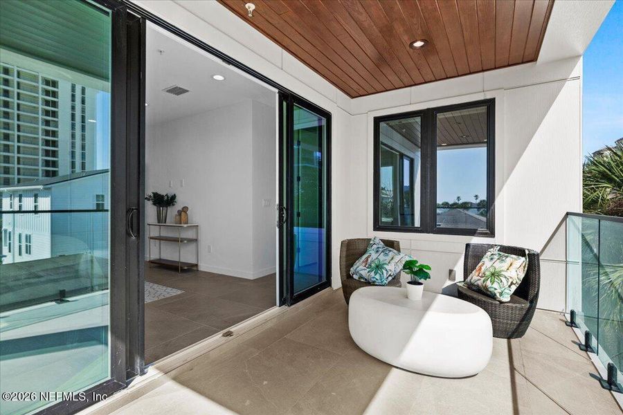 Exterior details and patio area of a home in , Jacksonville Beach (Image 32).