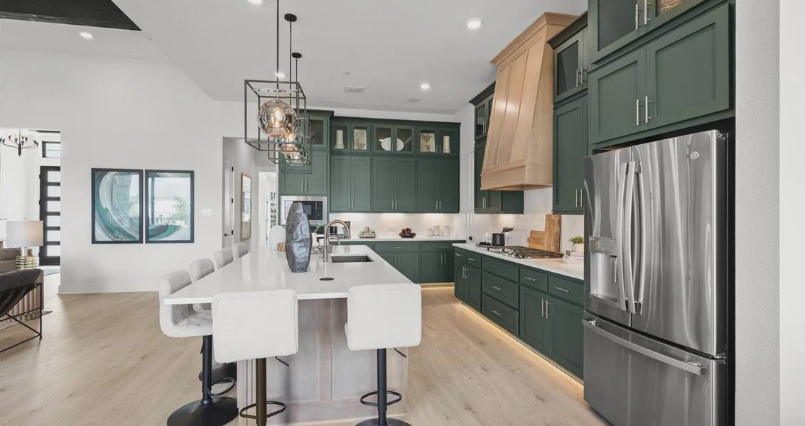 Representative furnished interior of a home built from the Stetson by Chesmar Homes in Sweetwater, Austin (Image 9).