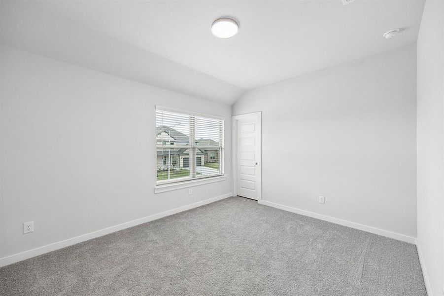 Bedroom in the Winters home plan by Trophy Signature Homes – REPRESENTATIVE PHOTO