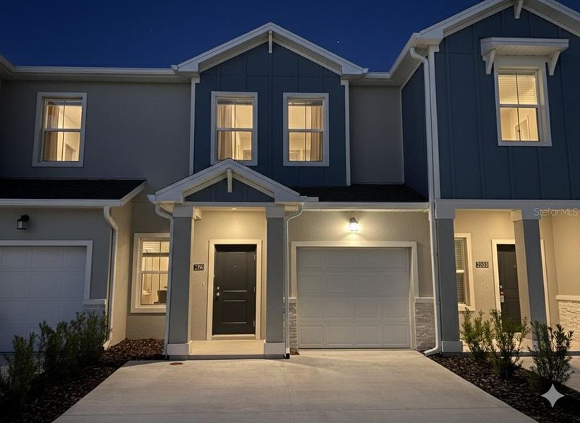 Front exterior of a new home in , Kissimmee, FL, highlighting curb appeal (Image 1). Front exterior of a new home in , Kissimmee, FL, highlighting curb appeal (Image 1).