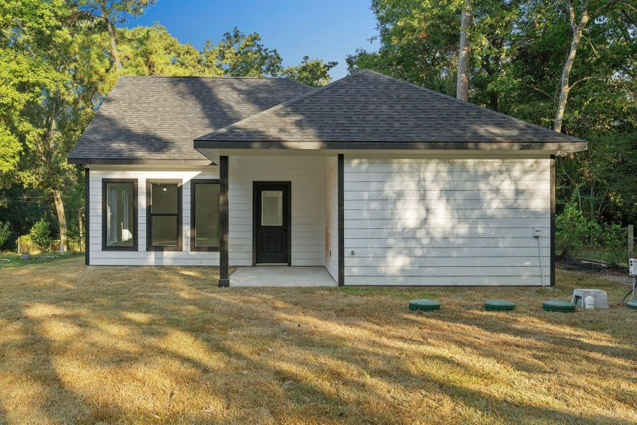 Exterior details and patio area of a home in , Willis (Image 1). Exterior details and patio area of a home in , Willis (Image 1).