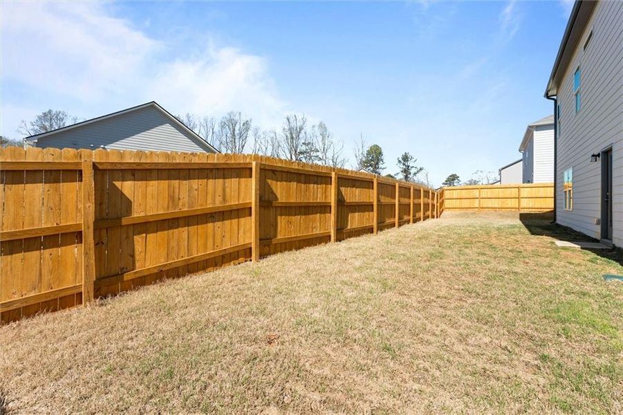 Exterior details and patio area of a home in , Douglasville (Image 24).