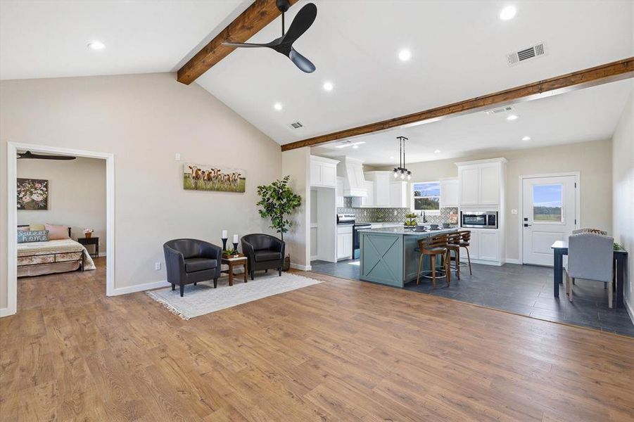 Open concept Living room, dining and kitchen.