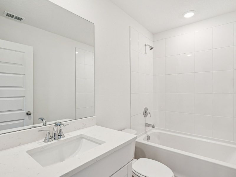 Furnished interior view inside a new home in Two Rivers - Premier Series, Zephyrhills (Image 6).