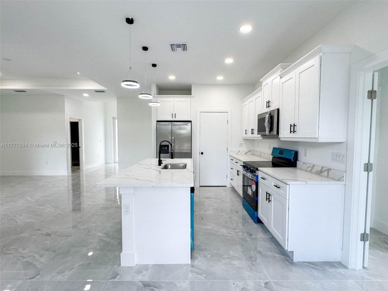 Furnished interior view inside a new home in , Lehigh Acres (Image 3). Furnished interior view inside a new home in , Lehigh Acres (Image 3).