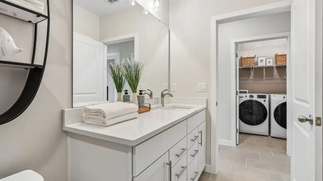 Flagler Floor Plan Shared Bath well appointed across from the bathroom and off of the garage.