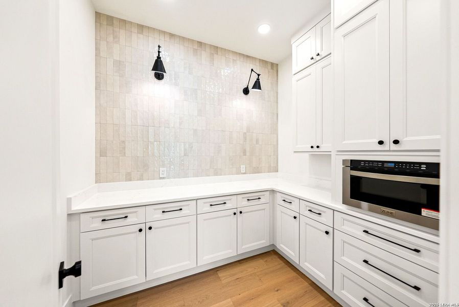 Furnished interior view inside a new home in , Boerne (Image 10).