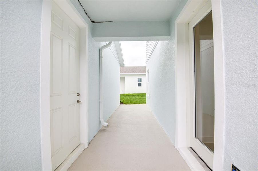Exterior details and patio area of a home in Bungalow Walk at Lakewood Ranch, Lakewood Ranch (Image 18).