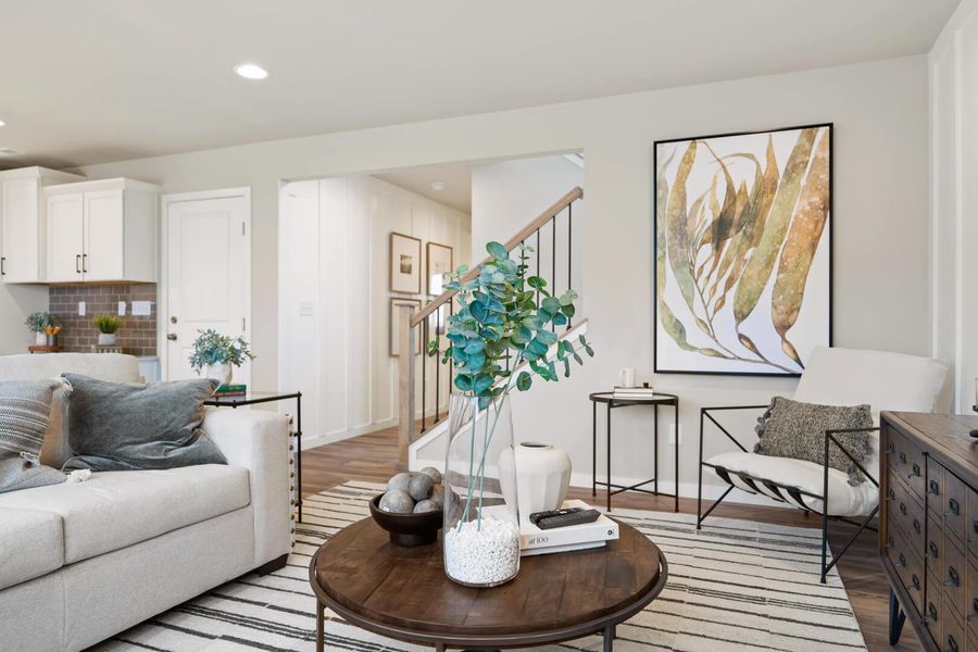 Representative furnished interior of a home built from the The Bellhaven by Challenger Homes in Sky Ranch - Highland Collection, Watkins (Image 11).