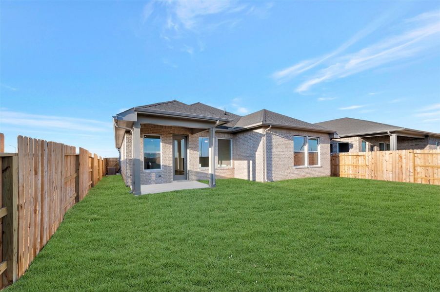 Exterior details and patio area of a home in The Grand Prairie 50’, Hockley (Image 3).