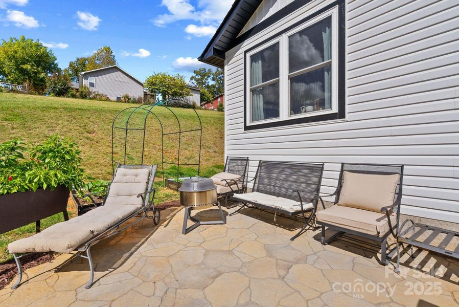 This patio creates the perfect spot for chilling by the firepit! This patio creates the perfect spot for chilling by the firepit!