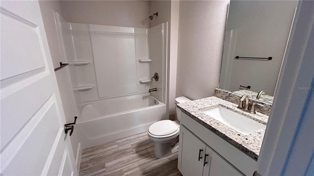 Furnished interior view inside a new home in Abbey Glen, Dade City (Image 8).
