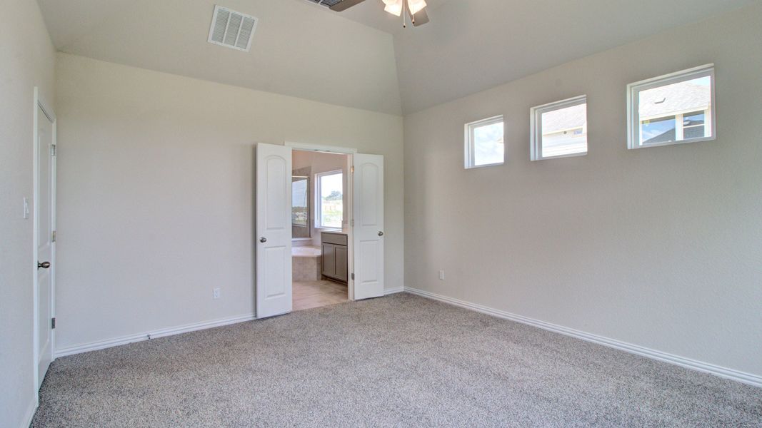 Furnished interior view inside a new home in The Crossvine, Schertz (Image 16).