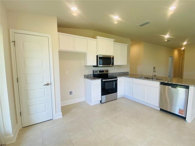 Furnished interior view inside a new home in , St. Cloud (Image 3).