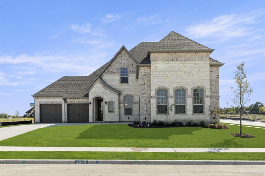 Representative exterior photo of a completed home built from the Preston by Windsor Homes in Nelson Lake Estates, Rockwall, TX (Image 2).