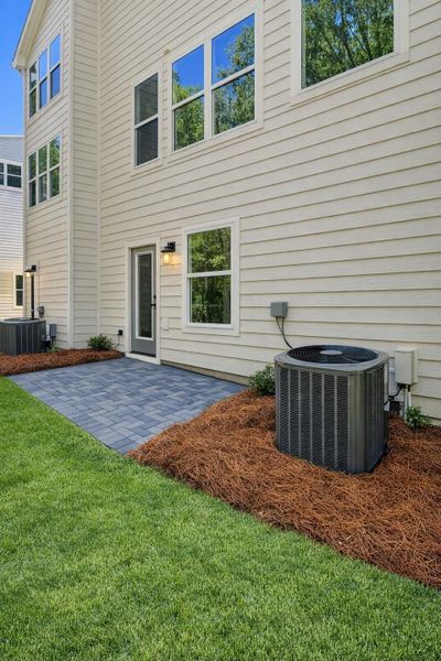 Exterior details and patio area of a home in , Johns Island (Image 3). Exterior details and patio area of a home in , Johns Island (Image 3).