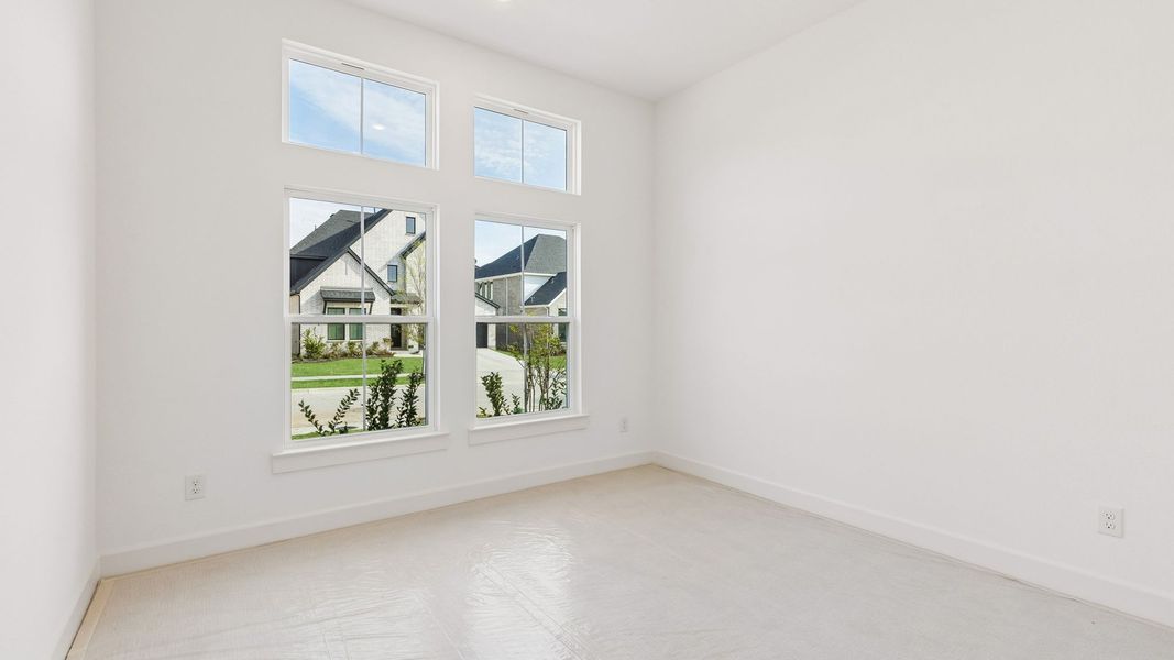 Representative unfurnished interior of a home built from the Chapelle III by Normandy Homes in Rainwater Crossing, Celina (Image 13).