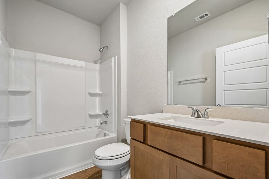 Furnished interior view inside a new home in Hymeadow, San Marcos (Image 10).