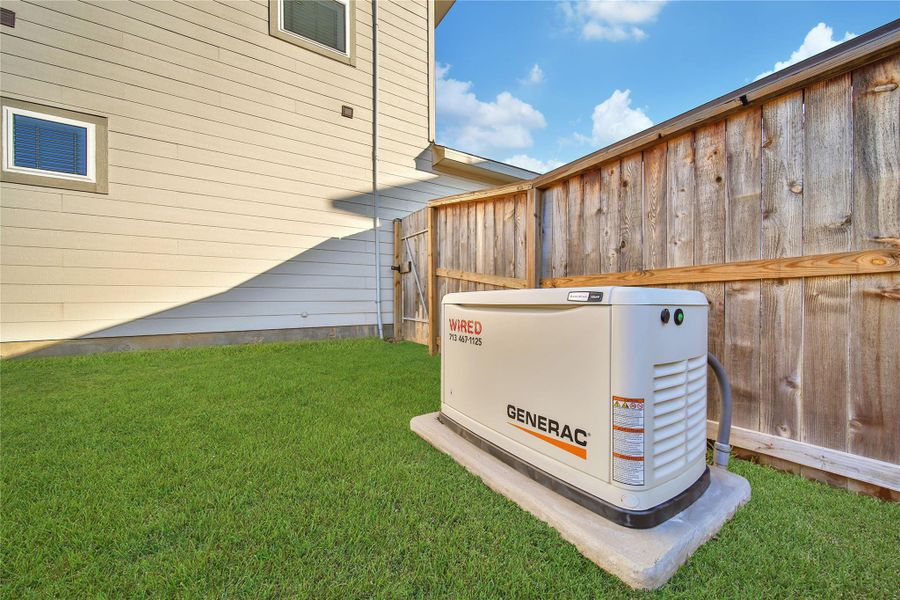Exterior details and patio area of a home in Magnolia Place, Magnolia (Image 29).