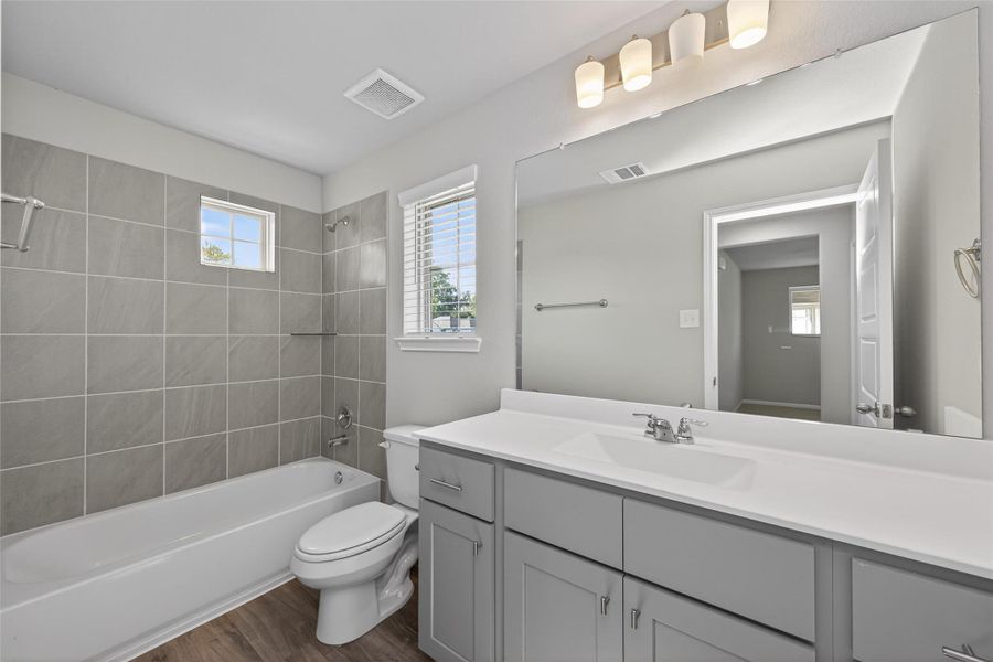 Furnished interior view inside a new home in Woodland Lakes, Huffman (Image 17).