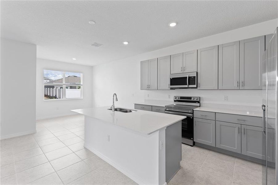 Furnished interior view inside a new home in Cypress Park Estates, Haines City (Image 2).