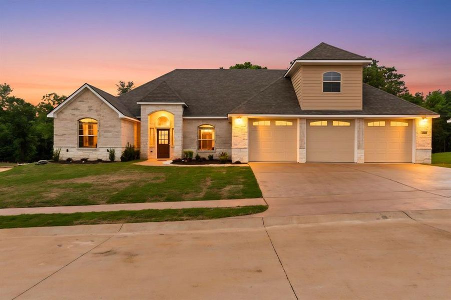 Front exterior of a new home in , Lindale, TX, highlighting curb appeal (Image 27).