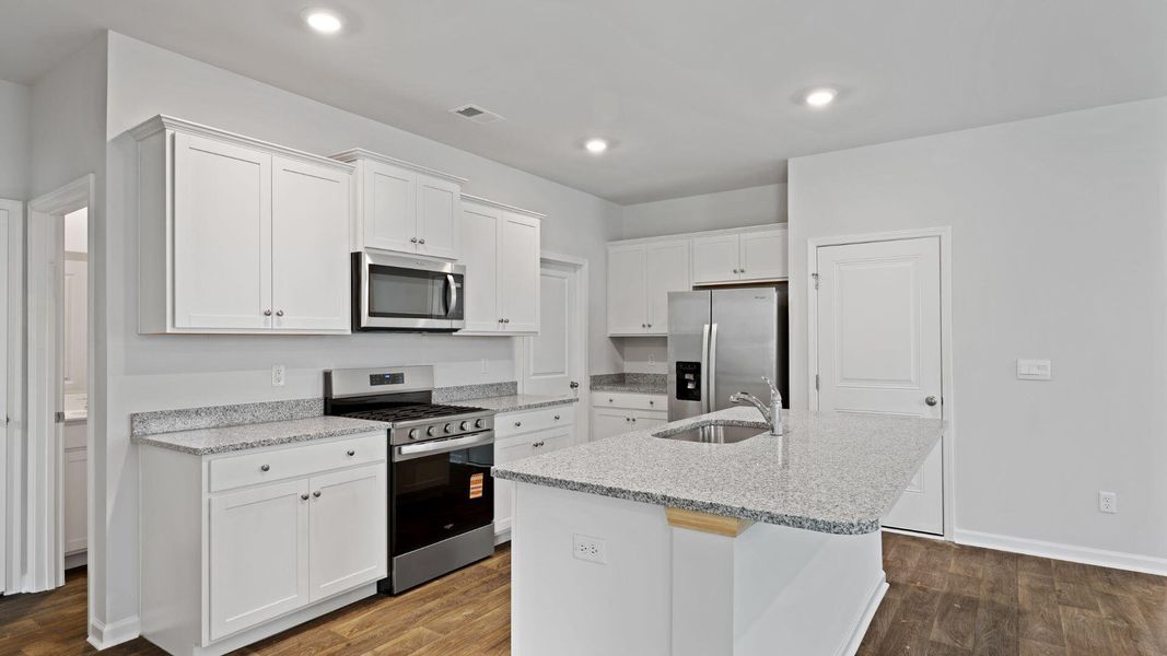 Furnished interior view inside a new home in Pine Hills at Cane Bay, Summerville (Image 3). Furnished interior view inside a new home in Pine Hills at Cane Bay, Summerville (Image 3).