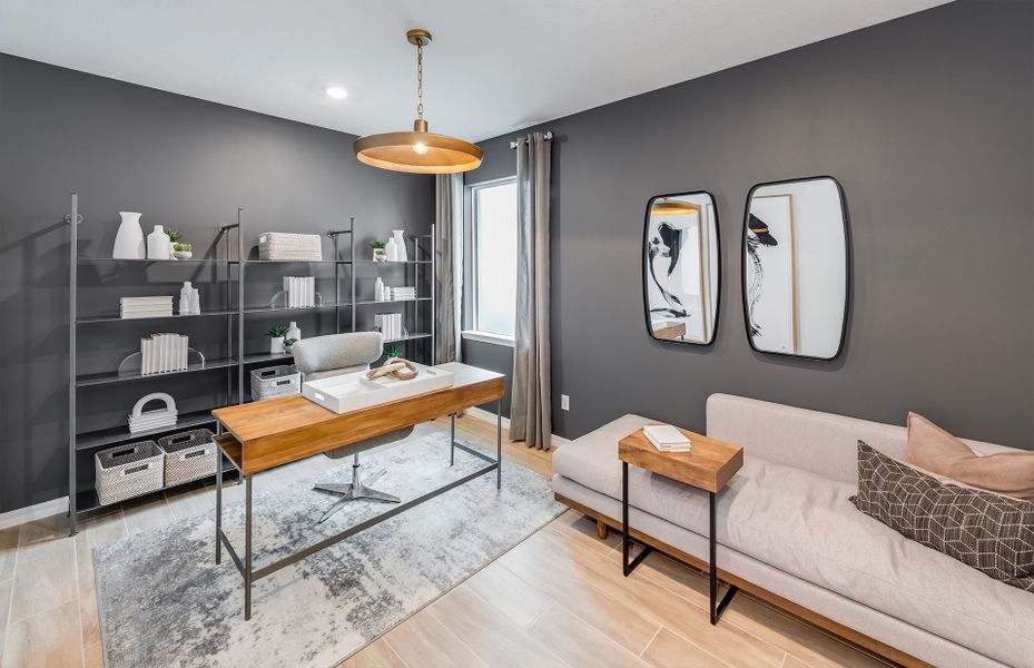 Representative furnished interior of a home built from the Livingston Grande by DiVosta in Bridgewater, Jupiter (Image 16).