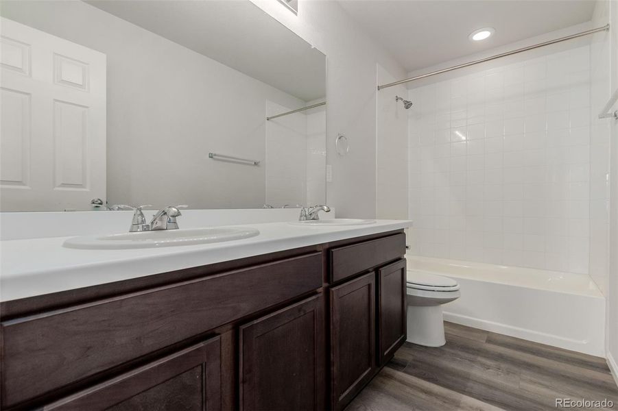 Furnished interior view inside a new home in The Aurora Highlands, Aurora (Image 8).