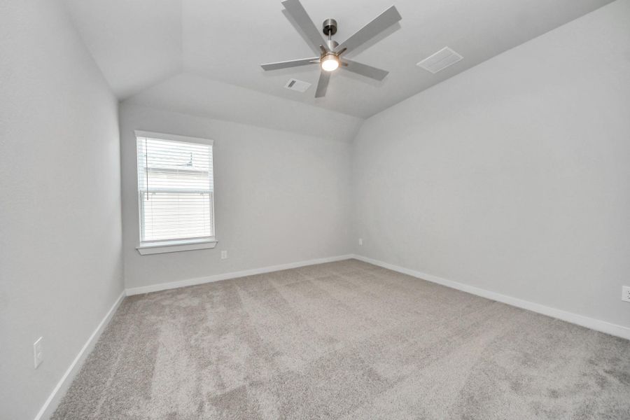 Generously sized secondary bedrooms featuring spacious closets, soft and inviting carpeting underfoot, large windows allowing plenty of natural light, and the added touch of privacy blinds for your personal retreat.