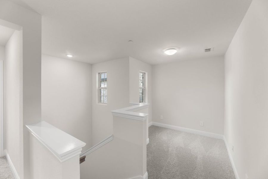 Front exterior of a new home in Main Street Village, Mansfield, TX, highlighting curb appeal (Image 15). Front exterior of a new home in Main Street Village, Mansfield, TX, highlighting curb appeal (Image 15).