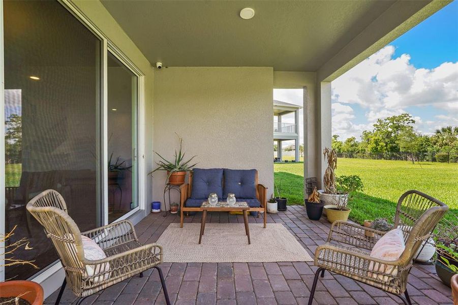 Exterior details and patio area of a home in Estates at Rivercrest, Sanford (Image 25).