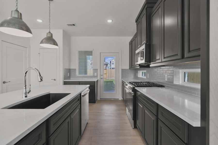 Representative furnished interior of a home built from the Riverdale by Chesmar Homes in Meridiana Courtyard Collection, Manvel (Image 7).