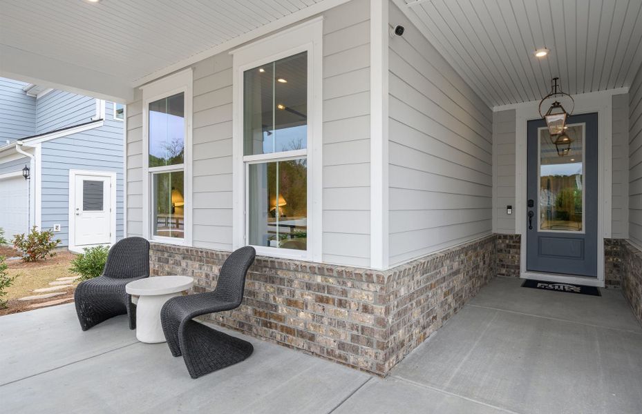 Exterior details and patio area of a home in Midpoint at New Riverside, Bluffton (Image 3). Exterior details and patio area of a home in Midpoint at New Riverside, Bluffton (Image 3).