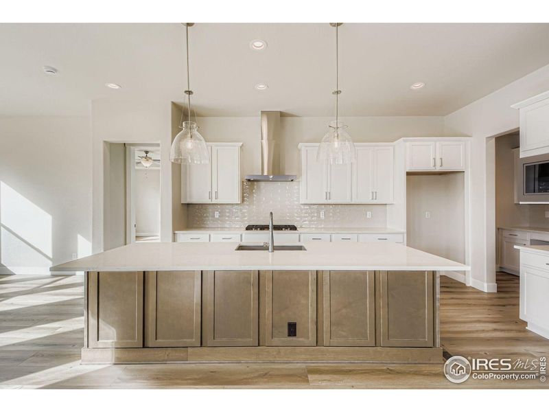 Furnished interior view inside a new home in RainDance National 60/70, Windsor (Image 8).