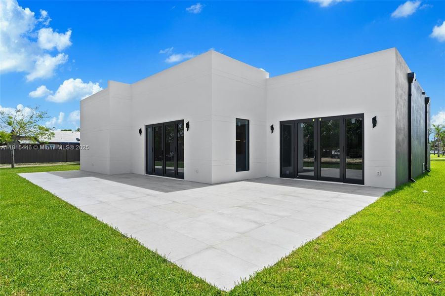 Front exterior of a new home in , Homestead, FL, highlighting curb appeal (Image 2).