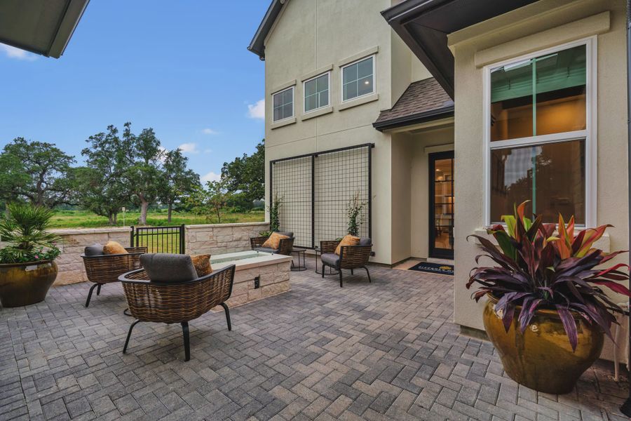 Outdoor Space with Seating and Fireplace