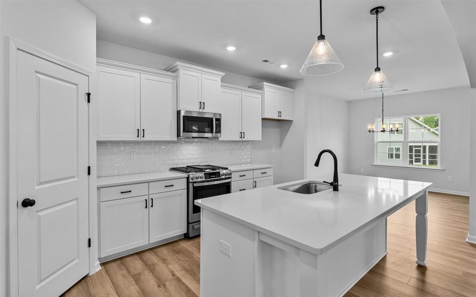 Furnished interior view inside a new home in Brayden, Advance (Image 11).