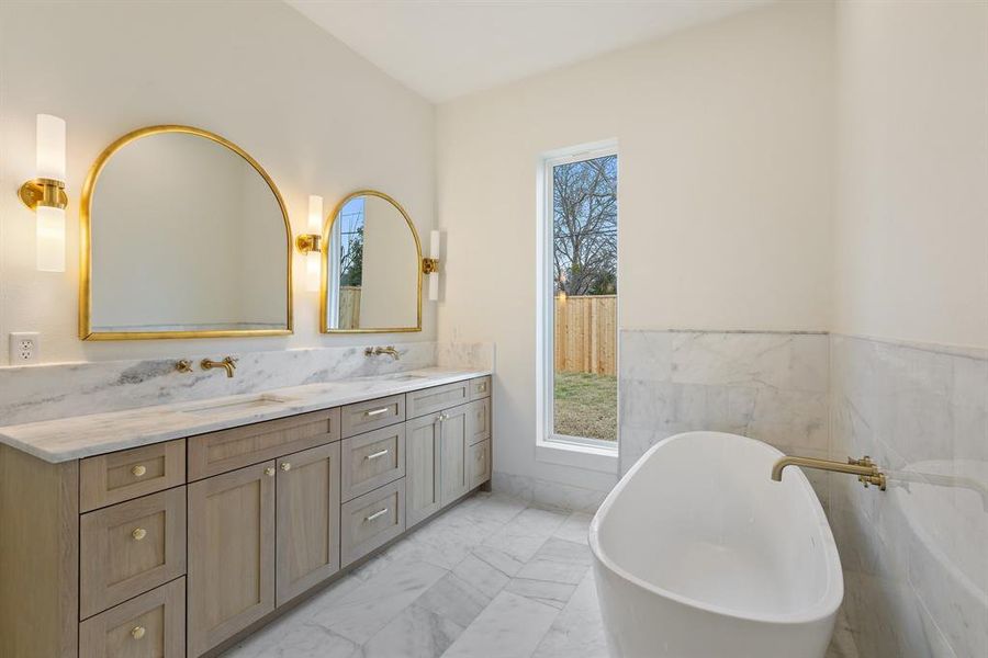 The primary bedroom boasts a luxurious ensuite bath for ultimate relaxation.