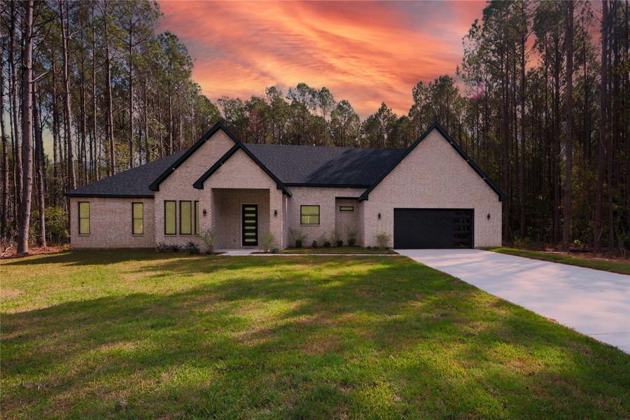 Fully brick home with high end finishes, custom windows, and oversized driveway. Fully brick home with high end finishes, custom windows, and oversized driveway.