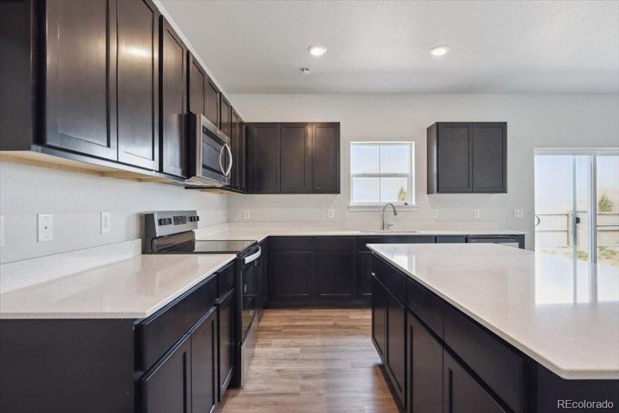 Furnished interior view inside a new home in Legato, Commerce City (Image 5). Furnished interior view inside a new home in Legato, Commerce City (Image 5).