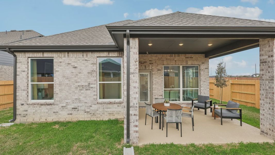 Representative exterior details of a home built from the Adele by Chesmar Homes in Sunterra, Katy (Image 3).