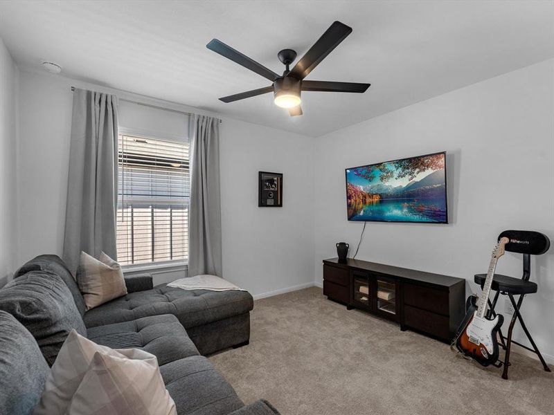 1 of 4 total bedrooms upstairs with this secondary room serving as a secondary living area