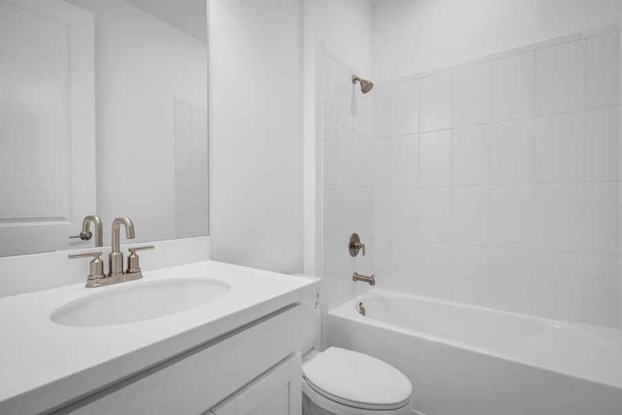 Furnished interior view inside a new home in The Cove at West Port, Port Charlotte (Image 9).