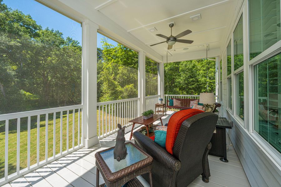 Exterior details and patio area of a home in Overlook at Copahee Sound, Awendaw (Image 32).