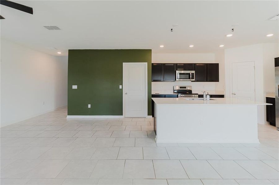 Furnished interior view inside a new home in Peace Creek Reserve, Winter Haven (Image 5). Furnished interior view inside a new home in Peace Creek Reserve, Winter Haven (Image 5).