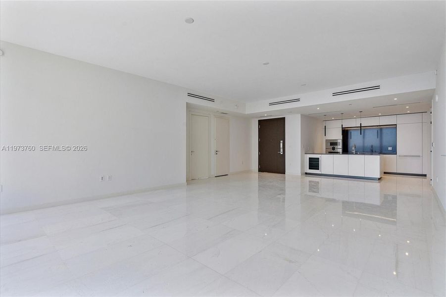 Spacious, unfurnished interior of a new home in Aston Martin Residences, Miami (Image 48).