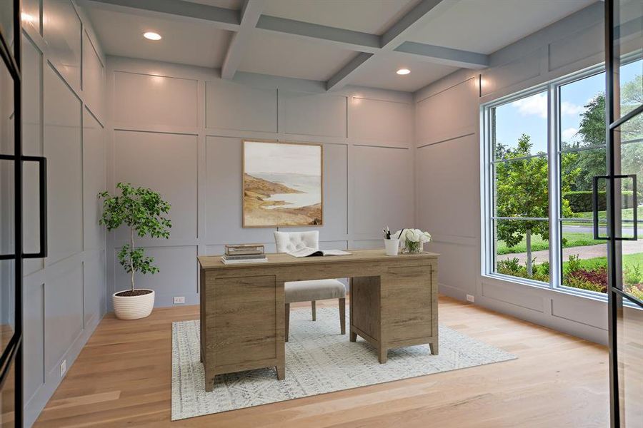 The spacious office features custom woodwork and large windows overlooking the front yard. *Virtually Staged